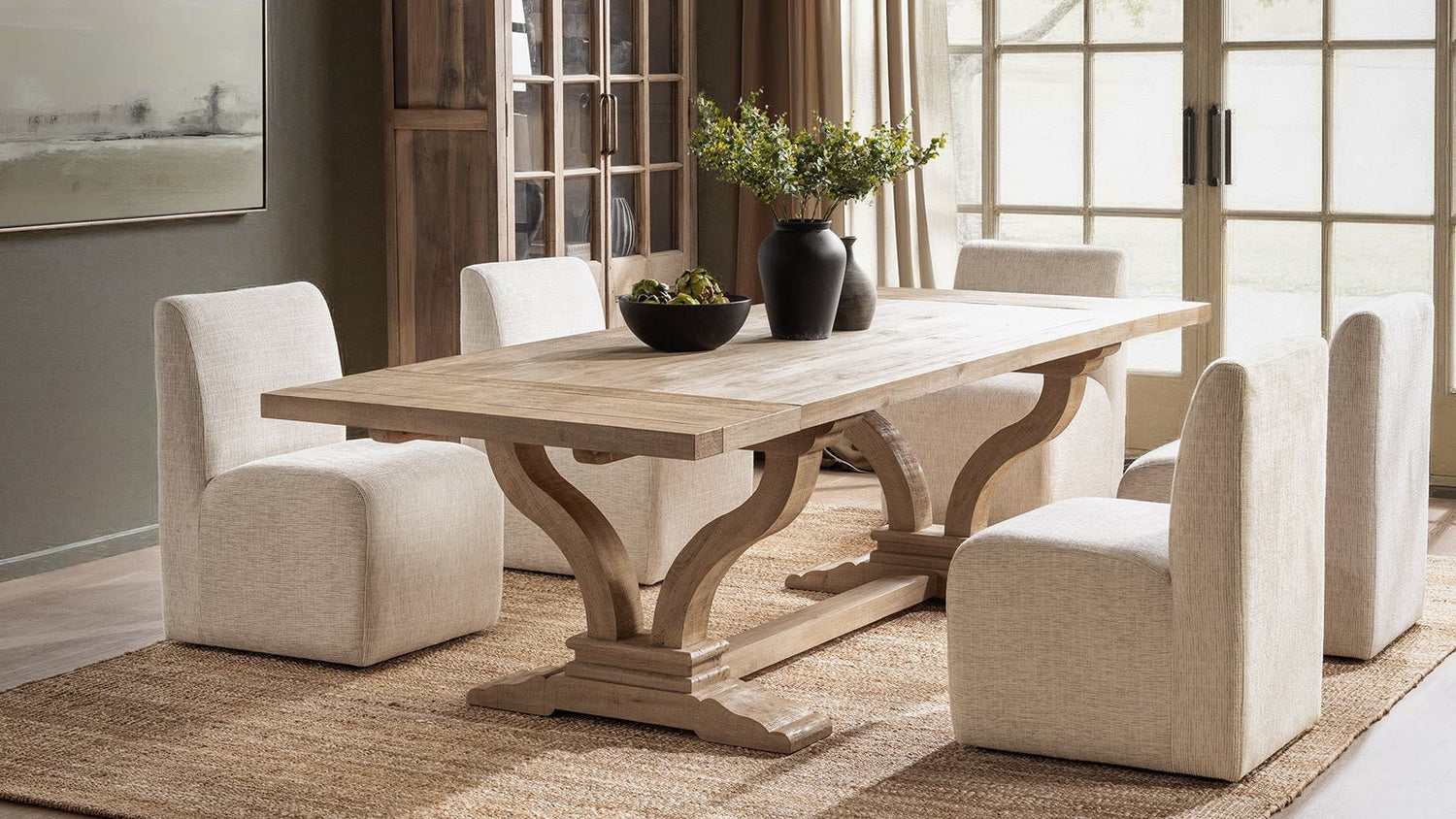 Julia Extendable Dining Table - Soft Earth by Classic Home in a styled dining room