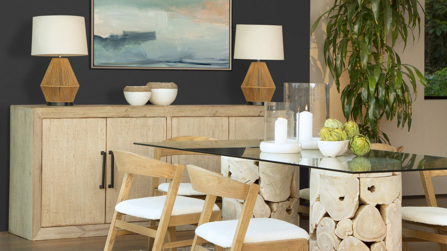 Layered dining room with a reclaimed wood sideboard and natural wood furniture