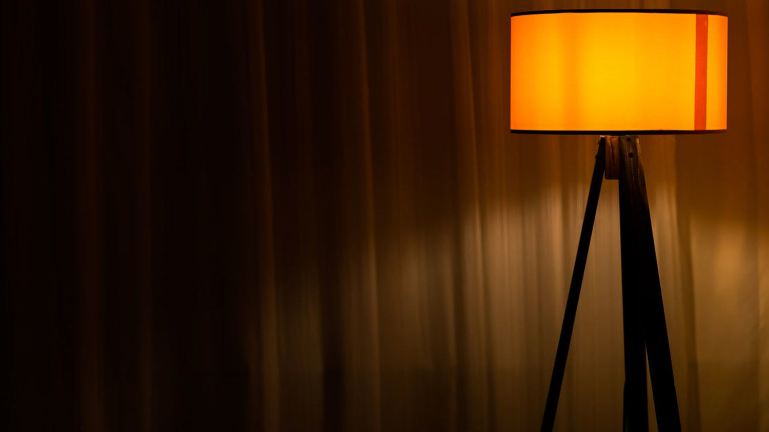 Wood floor lamp glowing in a modern interior