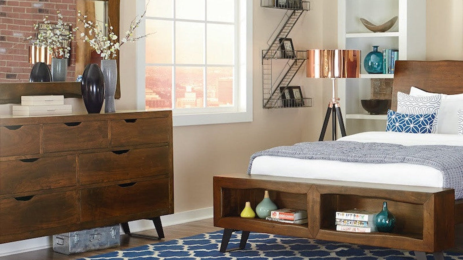 Solid wood dresser styled in a bedroom with matching bed and decor