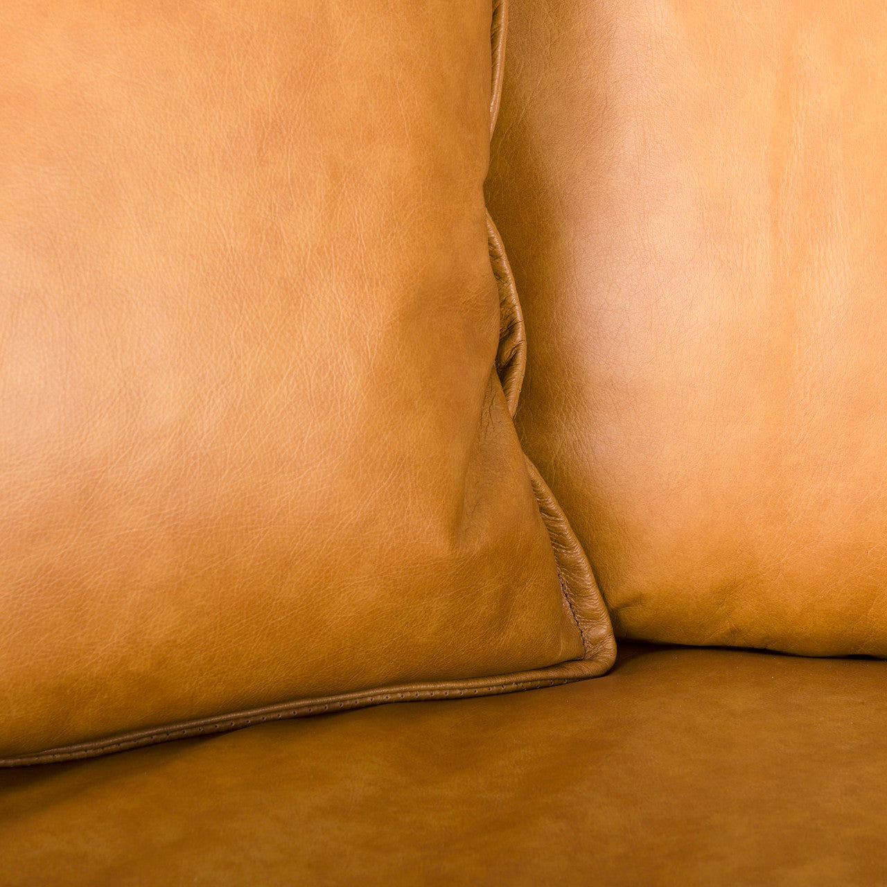 D'Arcy 111"L x 70"D x 33"H Tan Leather Right Chaise Sectional