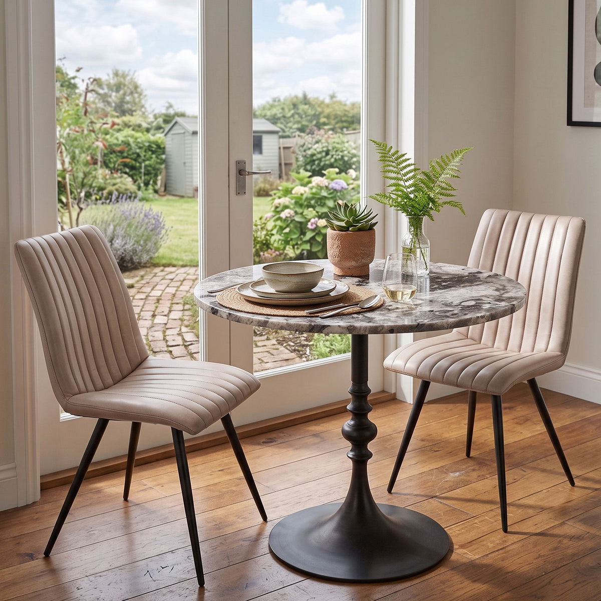 Dauphine 36" Round Bistro Table in Patagonia Marble with Black Base - image 3
