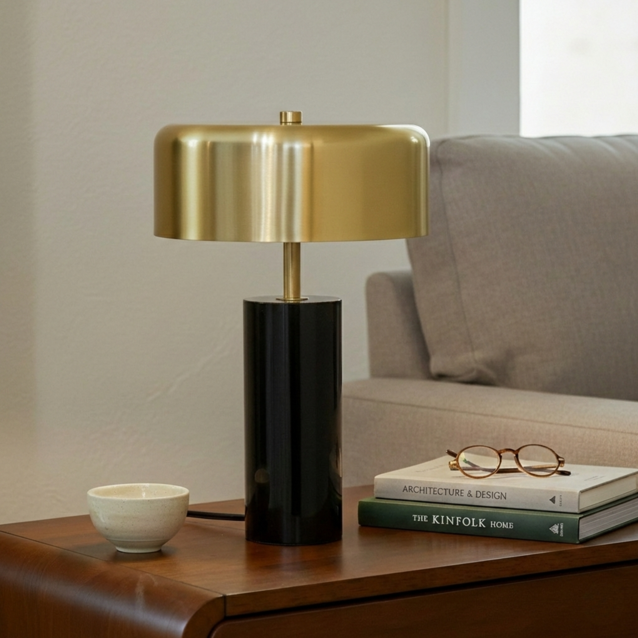 Kinetic Table Lamp | Lustrous Gold Drum and Sleek Black Base