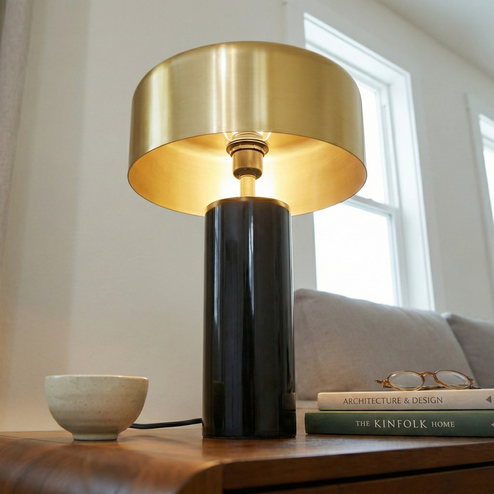 Kinetic Table Lamp | Lustrous Gold Drum and Sleek Black Base
