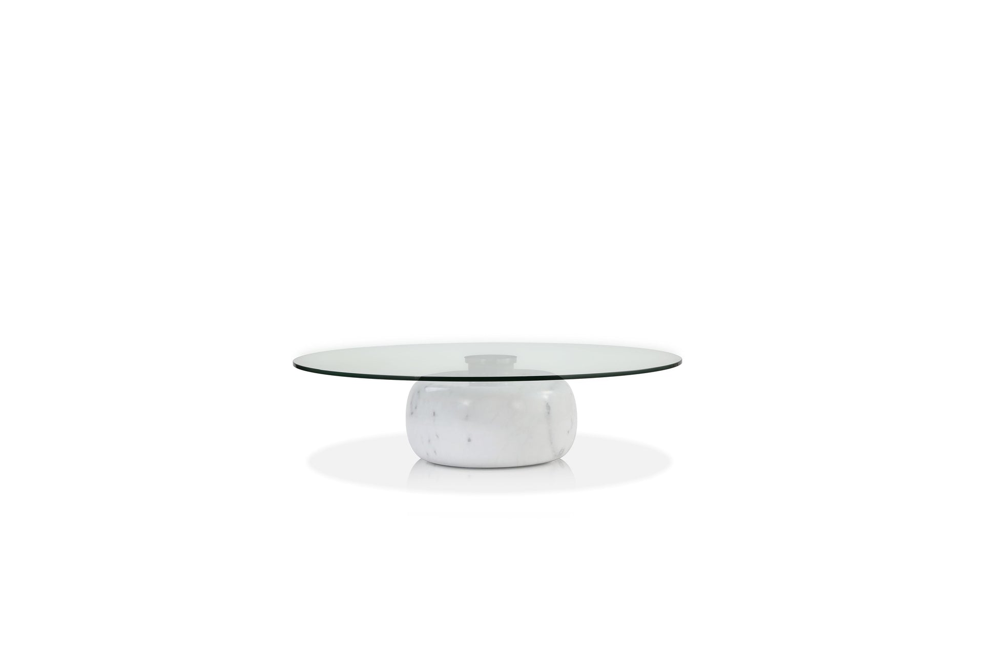 Round glass coffee table with a white ceramic base on a white background