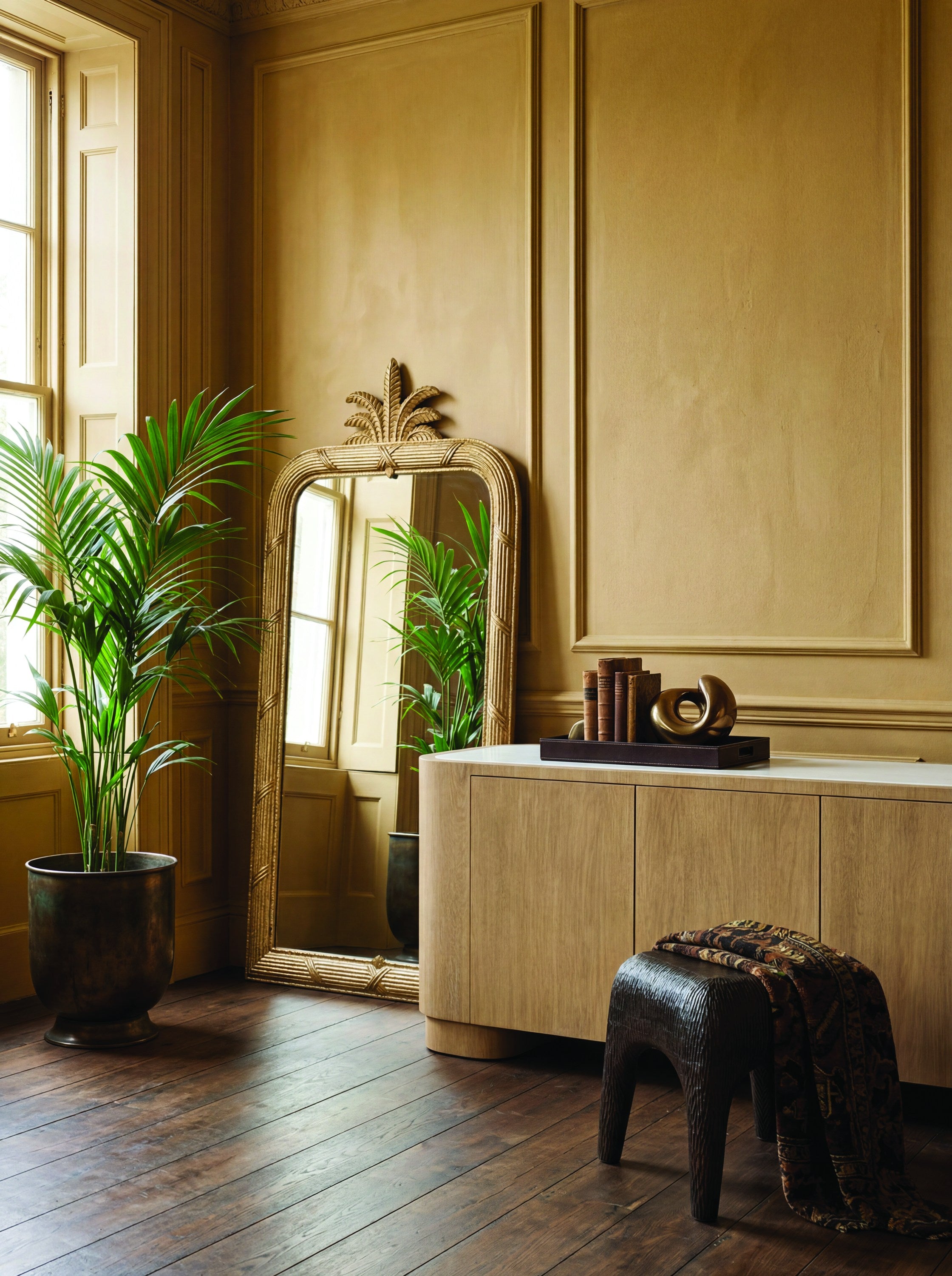 Gilded Pineapple Crest Mirror styled in a Sarreid room setting | ZIN Home