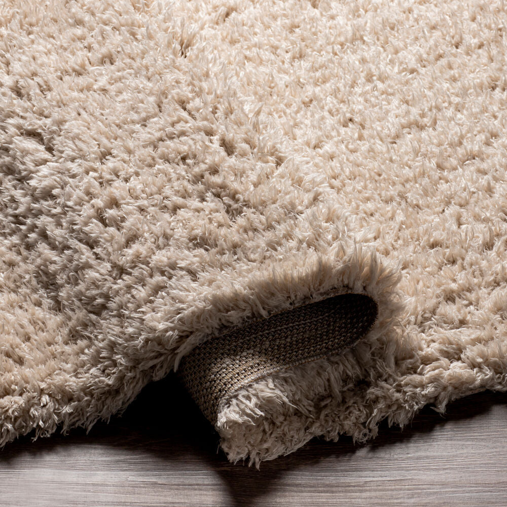 Angora Oatmeal Machine Woven Rug - fold