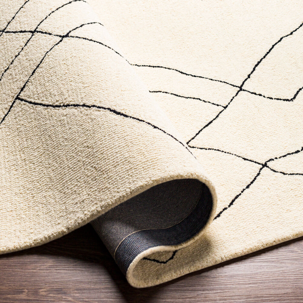 Arsenal Black/Cream Handmade Rug - fold