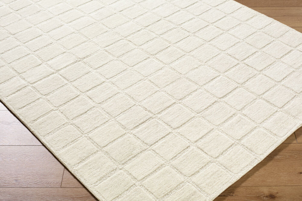 Benchcraft Light Beige Handmade Rug - corner