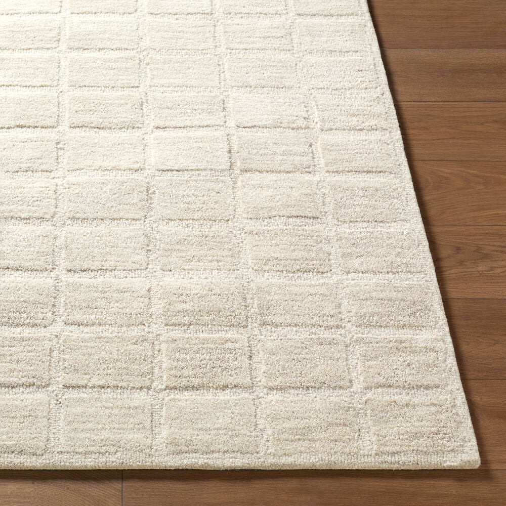 Benchcraft Light Beige Handmade Rug - front