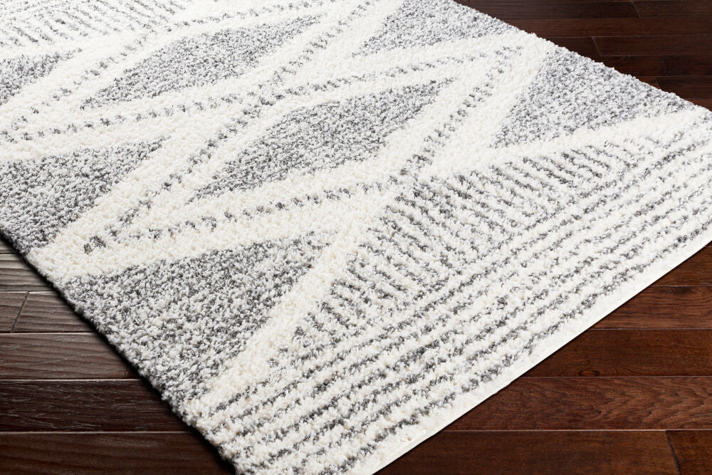 Deluxe Shag Charcoal/Cream Machine Woven Rug - corner