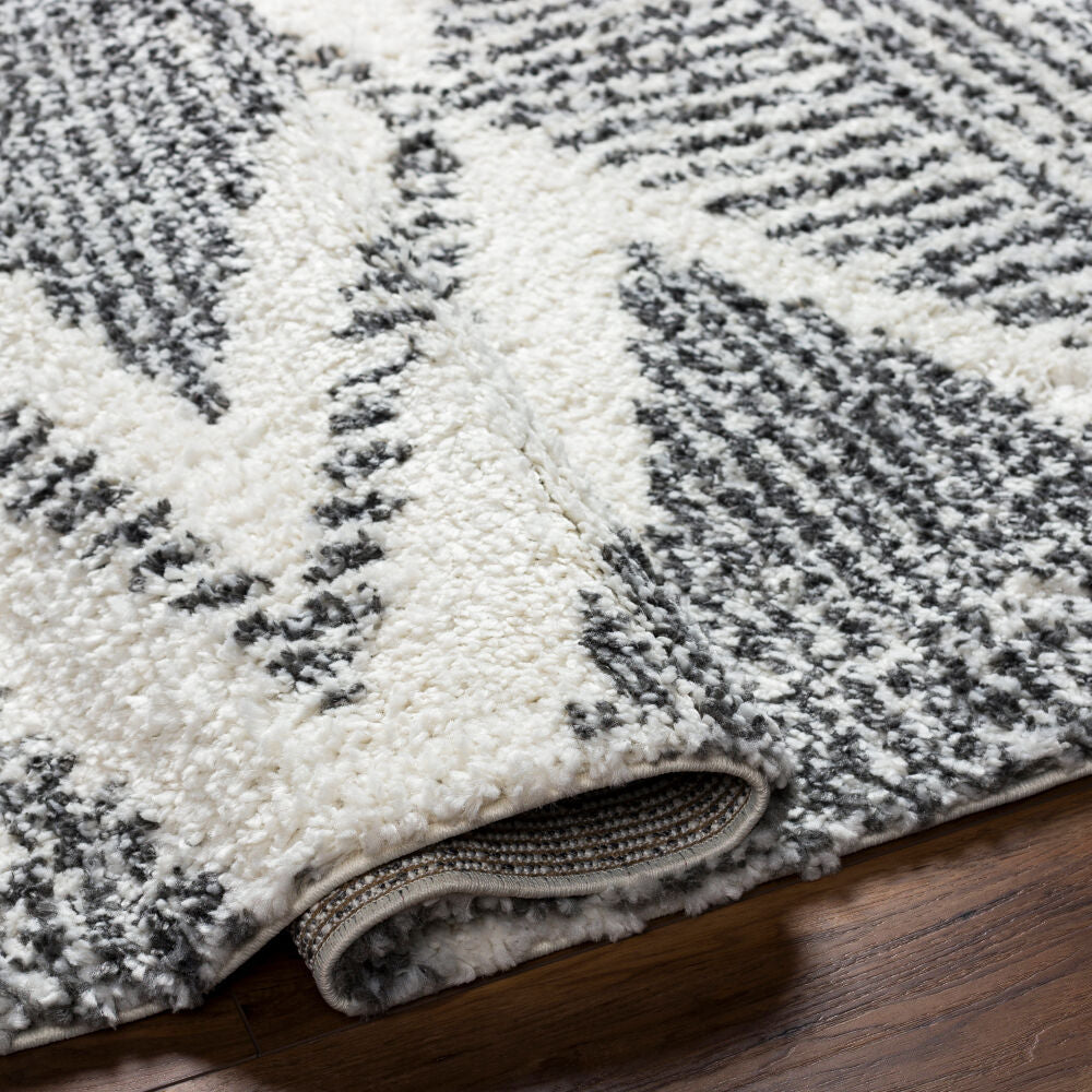 Deluxe Shag Charcoal/Cream Machine Woven Rug - fold