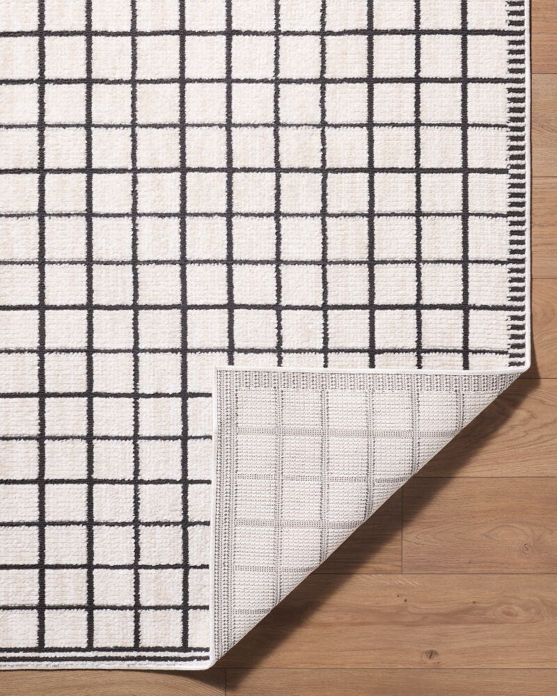 Odeon Black/Ivory Machine Woven Rug - fold