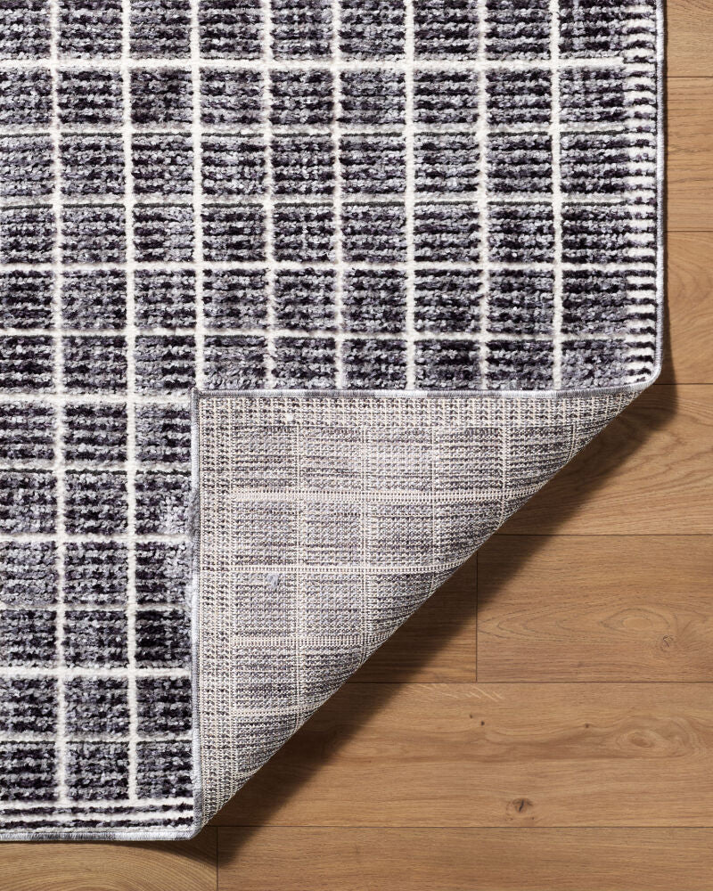 Odeon Black/Cream Machine Woven Rug - fold
