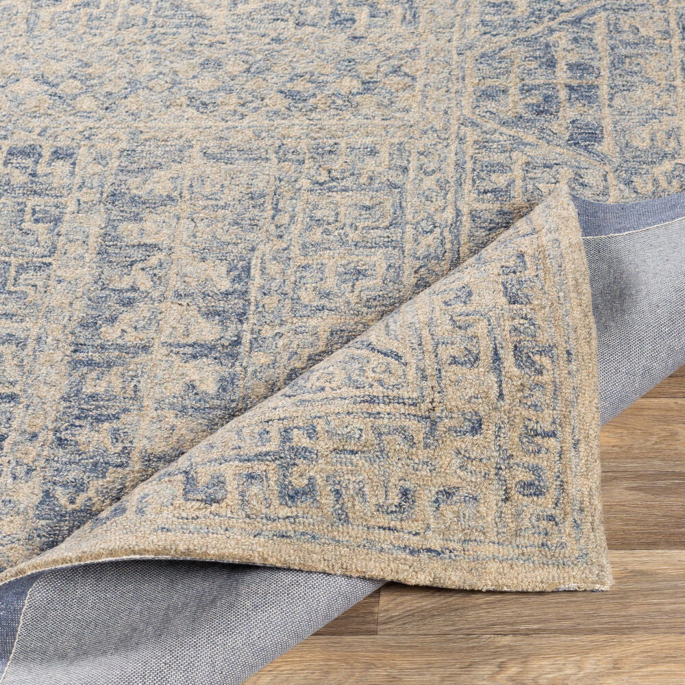 Granada Ivory/Navy Handmade Rug - fold