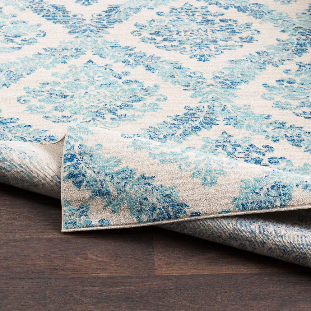 Harput Ivory/Teal Machine Woven Rug - fold