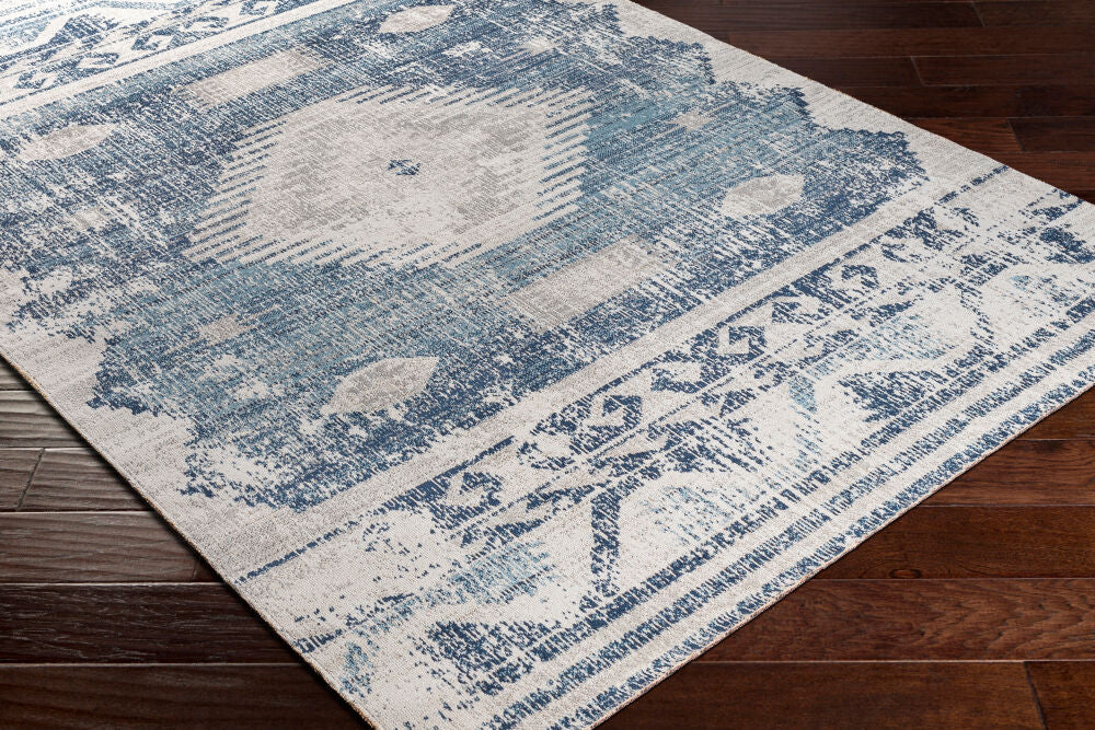 Huntington Beach Cream/Navy Machine Woven Rug - corner