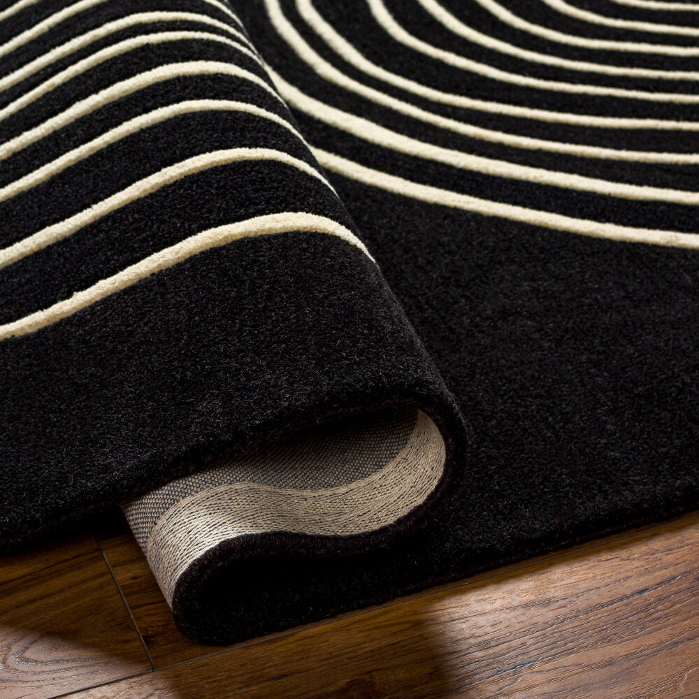 Isabel Beige/Black Handmade Rug - fold