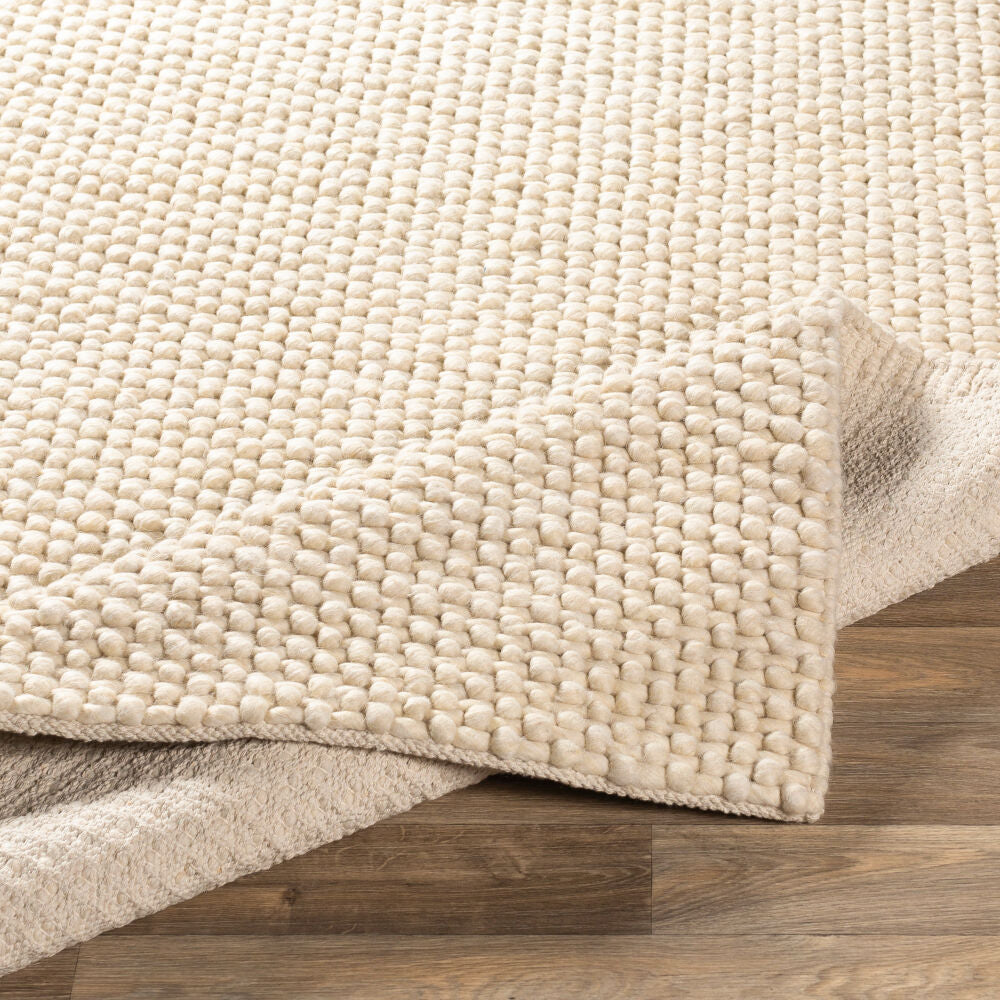 Lucerne Cream Handmade Rug - fold