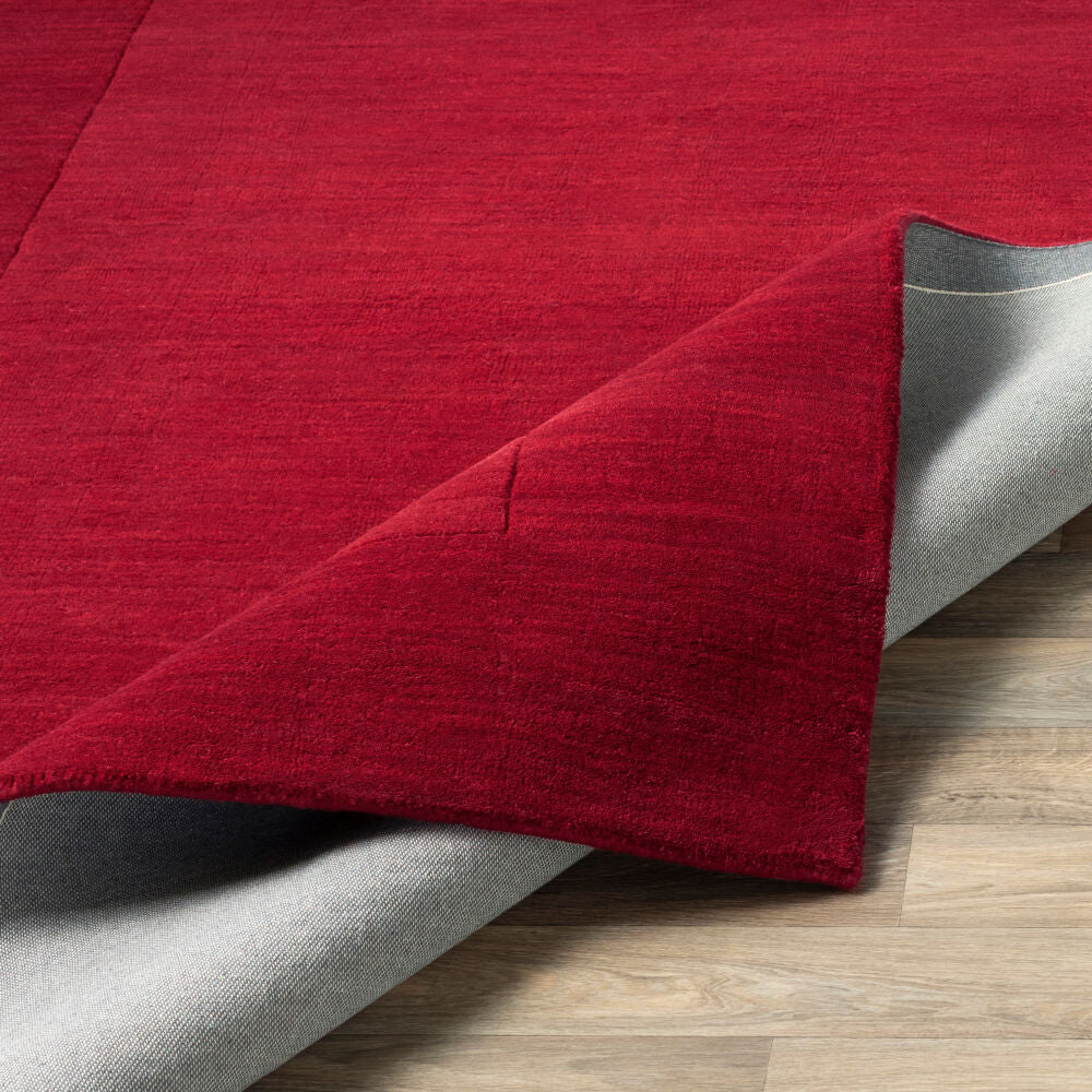 Mystique Red Handmade Rug - fold