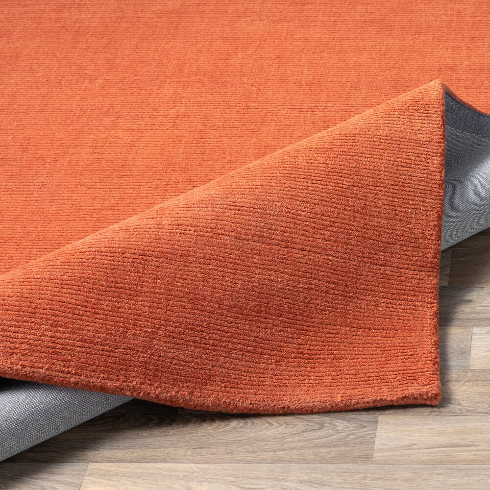 Mystique Burnt Orange Handmade Rug - fold