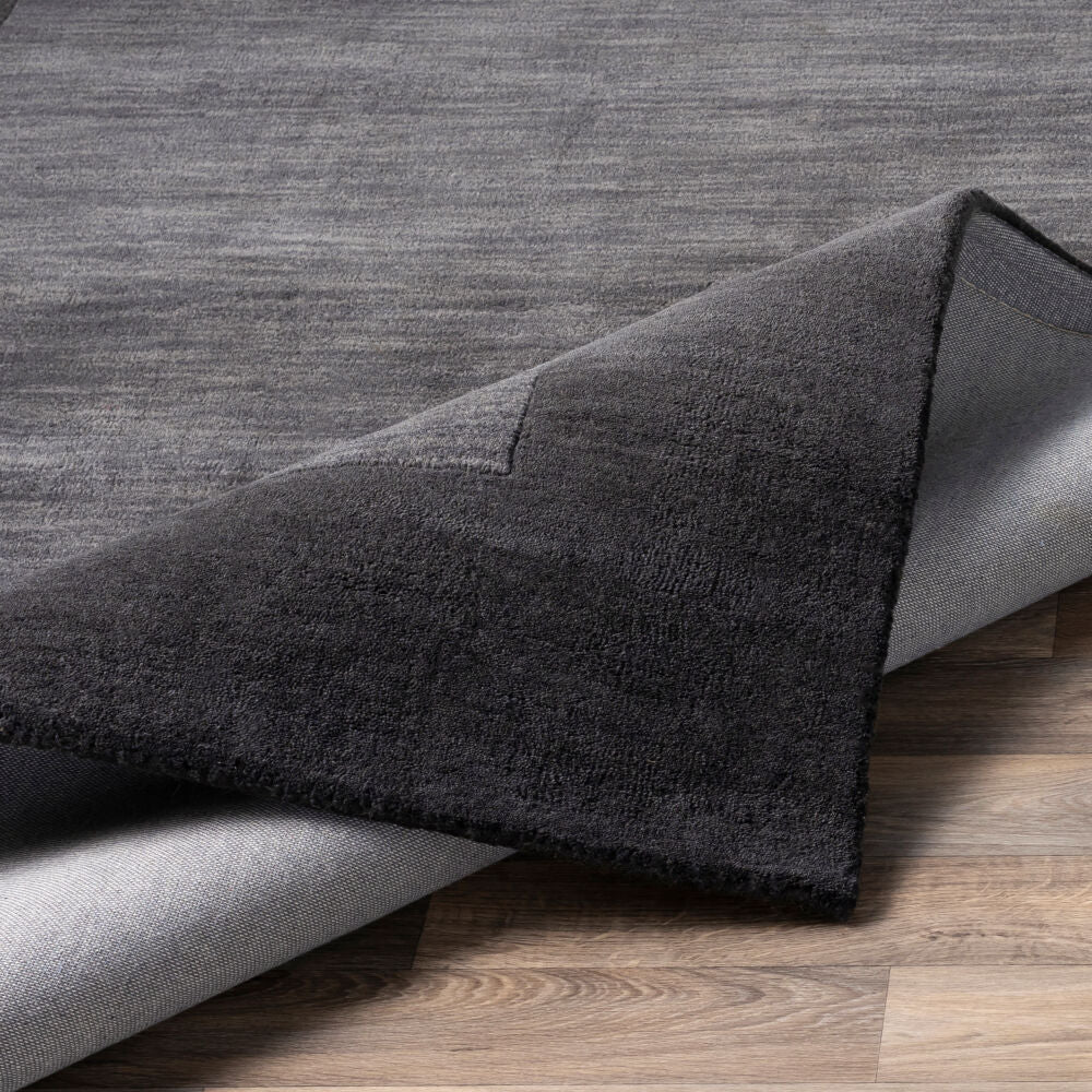 Mystique Black/Charcoal Handmade Rug - fold