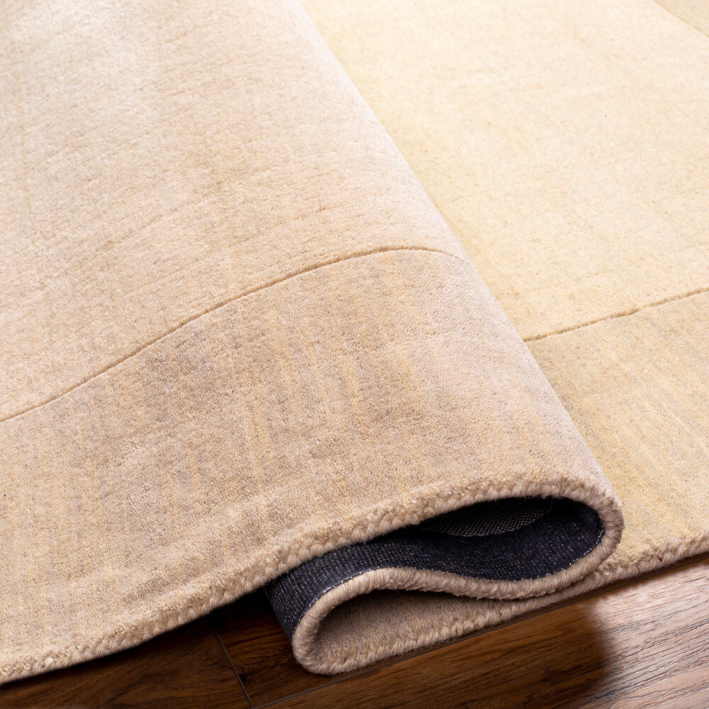 Mystique Beige/Cream Handmade Rug - fold