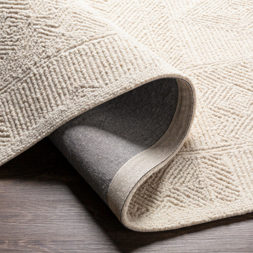 Newcastle Cream Handmade Rug - fold