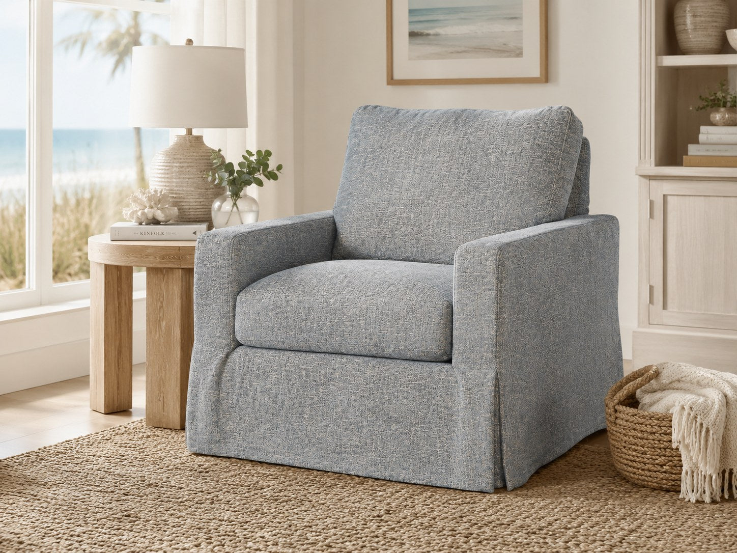 Peyton Slipcovered Swivel Chair in Plushtone Mineral lifestyle image - Mineral Coastal Transitional