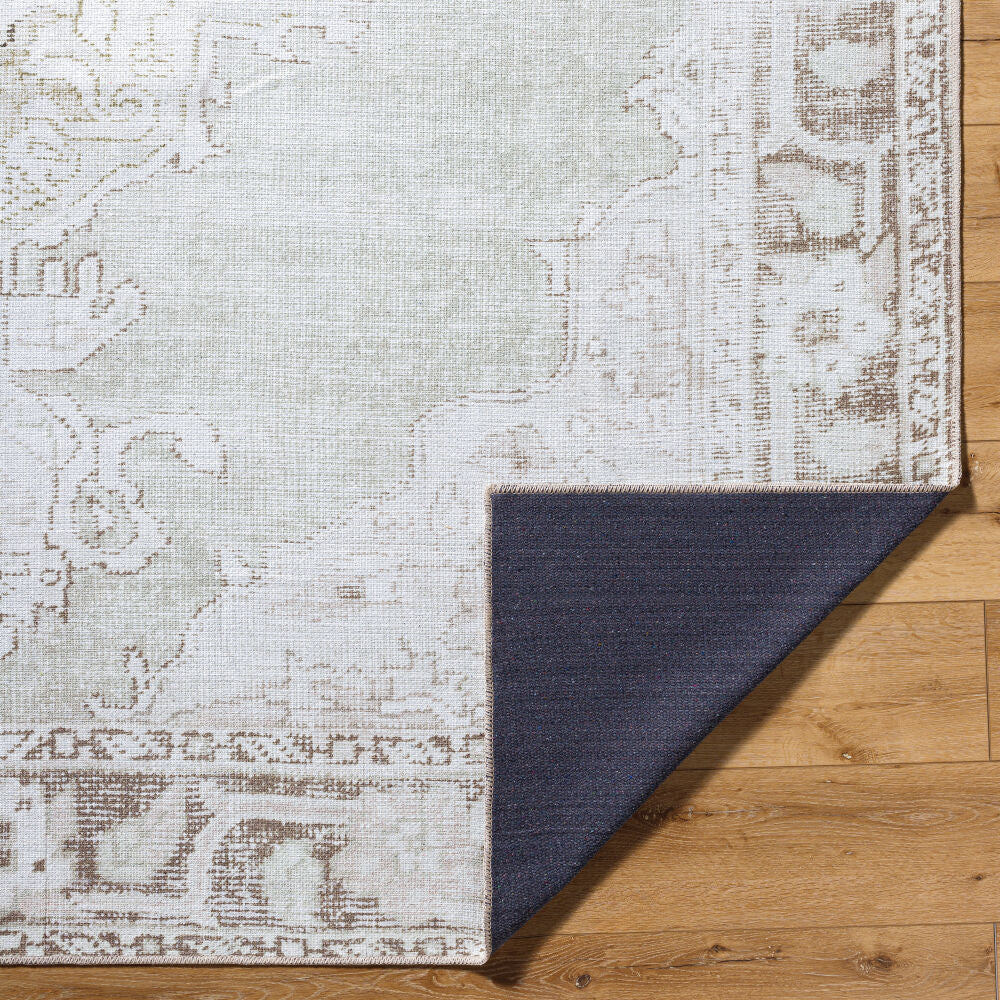 Rainier Cream/Oatmeal Machine Woven Rug - fold