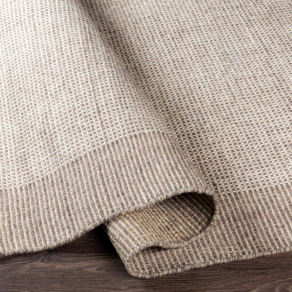 Reliance Beige/Cream Handmade Rug - fold