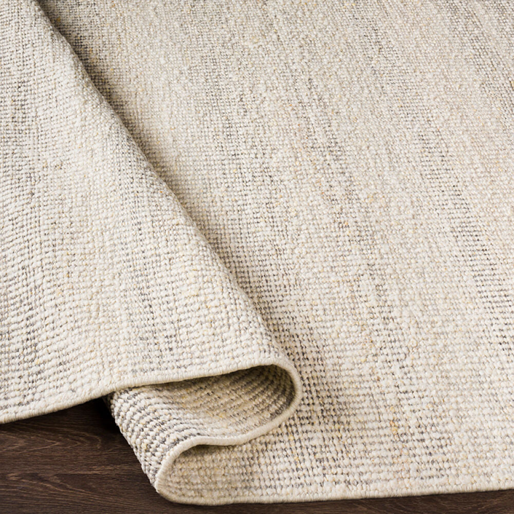Sadie Cream/Tan Handmade Rug - fold